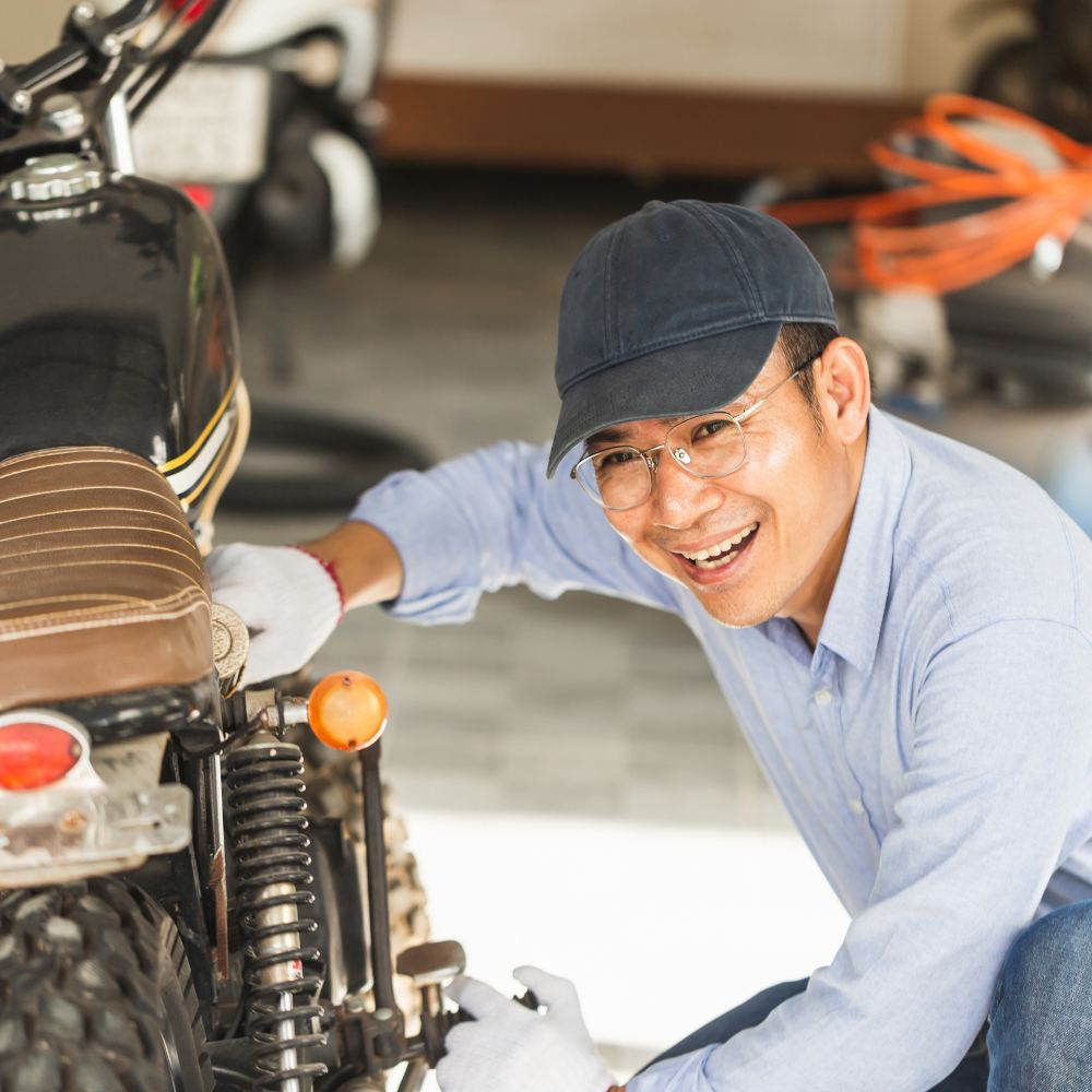 Mechanic servicing a motorcycle